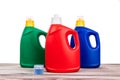 Regular liquid laundry detergent of various fragrance variant on wooden surface Royalty Free Stock Photo