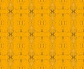 Regular ornate square and diamond pattern yellow ocher and brown seamless