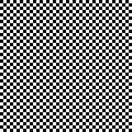 Regular pattern of squares in alternating black and white colors.