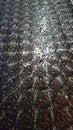 Regular pattern of water drops on metal surface