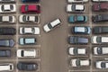 Regularity in car parking. A view to the carefully parked ranks of cars. Car navigation in the car park. Searching for vacant Royalty Free Stock Photo