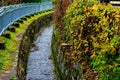 Regulated water stream in autumn