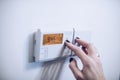 Regulating temperature on modern home heating control panel