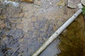 Regulation of poor water flow of the stream when it is necessary to slow down the flow of water in front of the bridge using beams