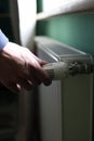 Regulator of heating system radiator in the bedroom Royalty Free Stock Photo