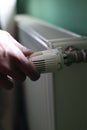 Regulator of heating system radiator in the bedroom Royalty Free Stock Photo