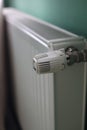 Regulator of heating system radiator in the bedroom Royalty Free Stock Photo