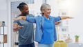 Rehabilitation, elderly woman and nurse for stretching exercise in a nursing home. Happy senior patient with a therapist Royalty Free Stock Photo