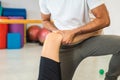 Rehabilitation leg treatment to a female patient