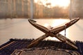 Rehal with open Quran and Muslim prayer beads on rug Royalty Free Stock Photo