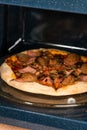 reheating pizza in the microwave Royalty Free Stock Photo