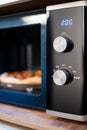 reheating pizza in the microwave Royalty Free Stock Photo