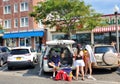 Rehoboth Beach, Delaware, U.S - June 18, 2023 - A family preparing to get into the beach from the public parking spot