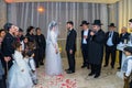 Rehovot, Israel - 11.01.2019. Rabbi blessing Jewish bride and groom in Jewish chasid wedding