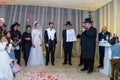 Rehovot, Israel - 11.01.2019. Rabbi blessing Jewish bride and groom in Jewish chasid wedding