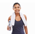 Rehydrating after and invigorating workout. A young woman holding a bottle of water after an energizing workout.