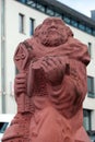 Reichenbach, Germany - March 27, 2023: Sculpture of a man with book and keys, symbol of Reichenbach-im-Vogtland in Saxonia,