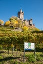 Reichsburg Cochem - Germany on mountan in the vineyards and in autumn. Castle on the mountain.