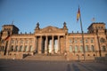 Reichstag building with flag poles in foreground Royalty Free Stock Photo