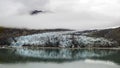 Glacier and mountain with clouds panorama, Alaska.