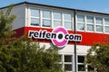 reifen.com Logo Sign on a Building Facade Royalty Free Stock Photo