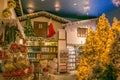 The reign of Santa Claus: beautiful christmas shop with balls, tree and decorations