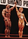 Mr. Olympia Lee Haney & Ms. Olympia Corey Everson Pose in Montreal in 1984 Royalty Free Stock Photo