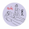 Reiki healing. Master Reiki conducts a treatment session for the patient. Alternative medicine. Royalty Free Stock Photo