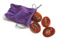 Reiki Stones and Purple Velvet carrying bag Royalty Free Stock Photo