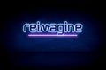Reimagine - blue neon announcement signboard Royalty Free Stock Photo