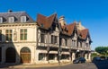 Reims summer street with traditional half-timbered building