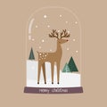 Reindeer Christmas snowglobe on brown background