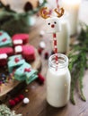 Reindeer decorated marshmallow in a bottle of milk