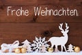 Reindeer, Gift, Tree, Golden Ball, Snow, Frohe Weihnachten Means Merry Christmas Royalty Free Stock Photo