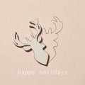 Reindeer head and text happy holidays