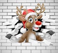Reindeer in Santa Hat Cartoon Breaking Brick Wall Royalty Free Stock Photo