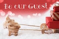 Reindeer With Sled, Red Background, Text Happy Be Our Guest Royalty Free Stock Photo