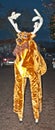 A reindeer on stilts Royalty Free Stock Photo