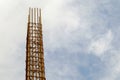 Reinforce concrete column construction with sky background