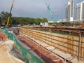 Reinforce Concrete retaining wall construction is in progress.