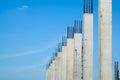 Reinforced concrete column structure in construction site with blue sky