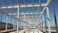 Reinforced Concrete Frame Of An Industrial Building. Camera Flight On A Construction Site. Beams With Steel Royalty Free Stock Photo