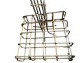 Reinforced concrete rebar cage, sharp focus on grid pattern. Royalty Free Stock Photo