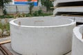 Reinforced concrete ring of wells close-up at a warehouse of a reinforced concrete plant.