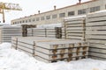 Reinforced concrete slabs intended for the construction of roads and airfields. Storage at the warehouse of the precast concrete.