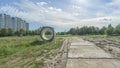 Reinforced concrete storm sewer pipes of large diameter stacked at a construction site. Sewer Large diameter pipes Royalty Free Stock Photo