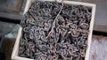 Reinforced steel anchor chain to prevent scratching. Weight of steel and metal iron. Rusty color and weathered condition.