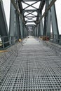 Reinforced structure for pouring concrete on a bridge deck