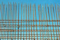 Reinforcement steel bars against blue sky background at construction site Royalty Free Stock Photo