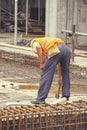 Reinforcing ironworker working on concrete formwork 5